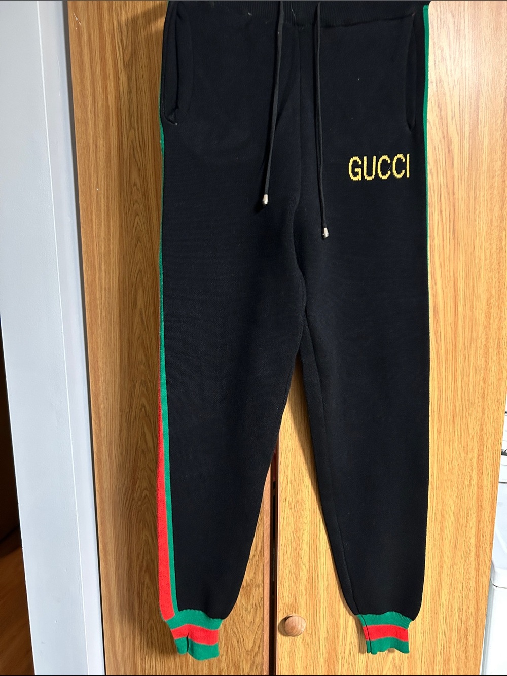 Black Sweatpants with Red & Green Stripes